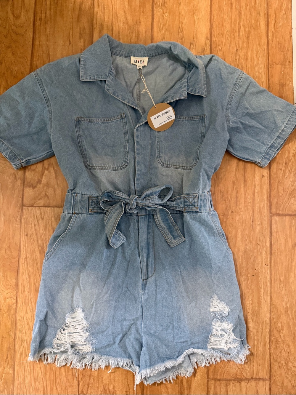 BiBi Light Blue Denim Tie-Waist Romper with Distressed Hem